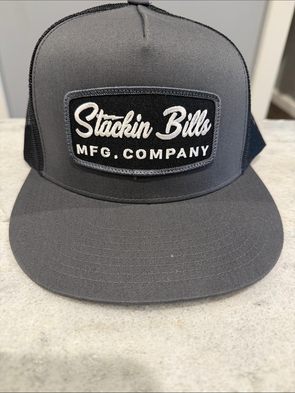 The Classic Black Mesh and Gray Visor Trucker Hat